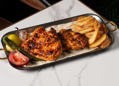 نصف دجاج مسحّب مشوّي