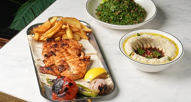 نصف دجاج مسحّب مشوّي